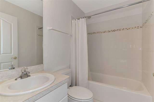 bathroom featuring vanity, toilet, and shower / bath combo with shower curtain