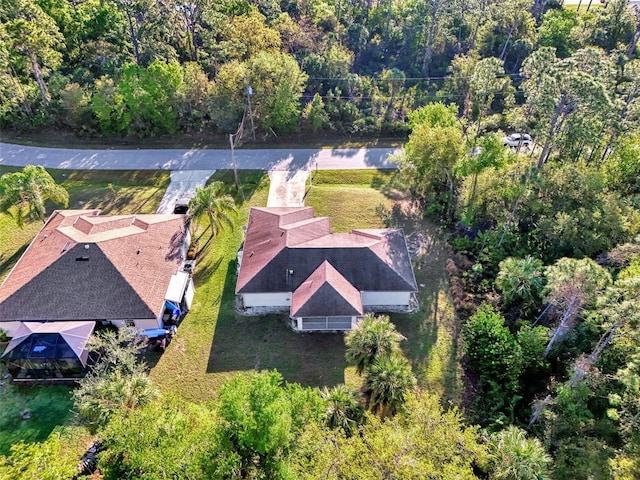 aerial view with a wooded view