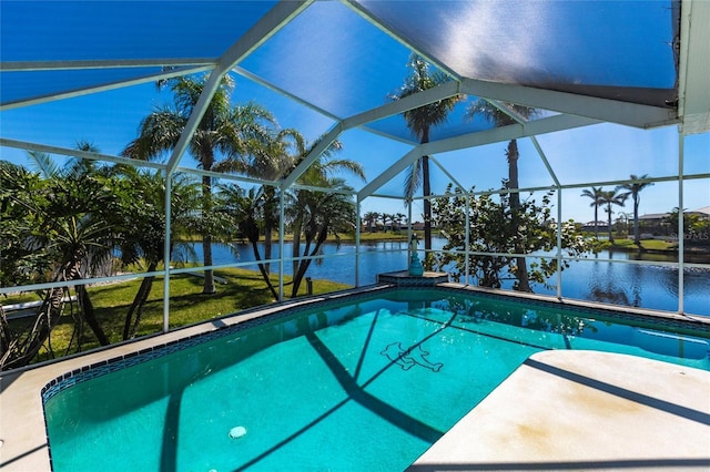 outdoor pool featuring a lanai and a water view