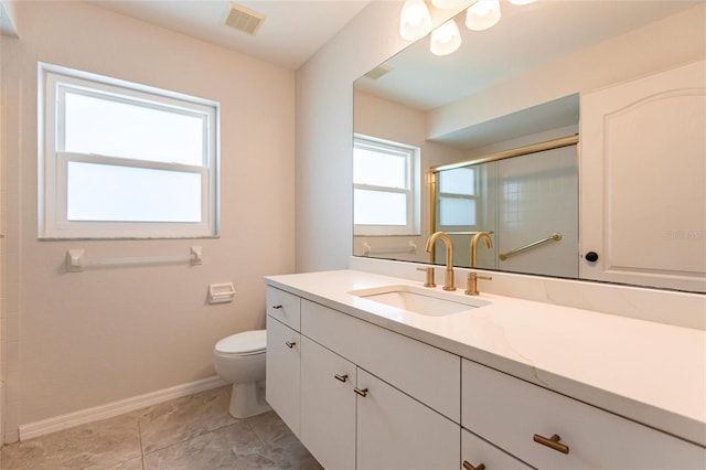 full bathroom with visible vents, toilet, a shower with door, baseboards, and vanity