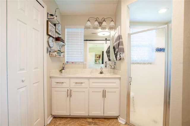 full bathroom with vanity and a shower stall