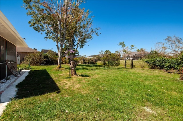 view of yard featuring fence