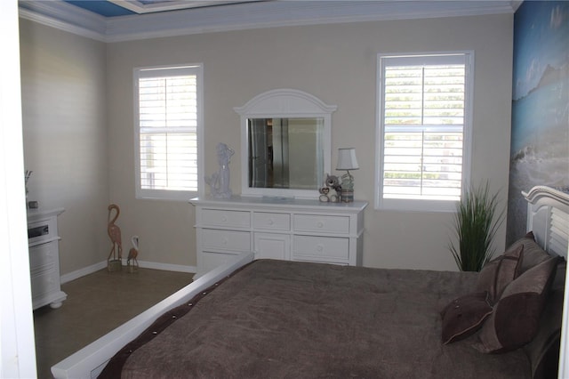 bedroom with baseboards and ornamental molding