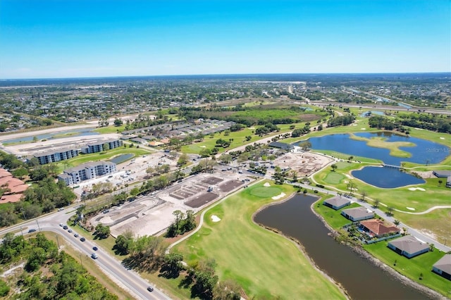 drone / aerial view featuring a water view and view of golf course