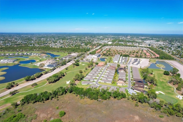 bird's eye view featuring a water view and golf course view