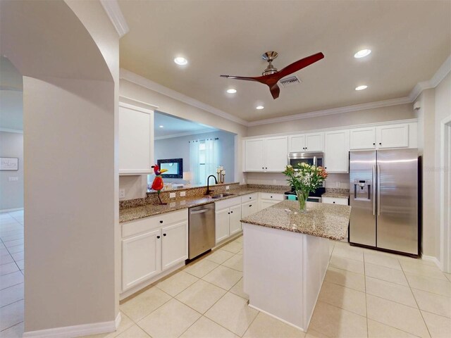 kitchen with white cabinetry, light tile patterned floors, visible vents, and appliances with stainless steel finishes