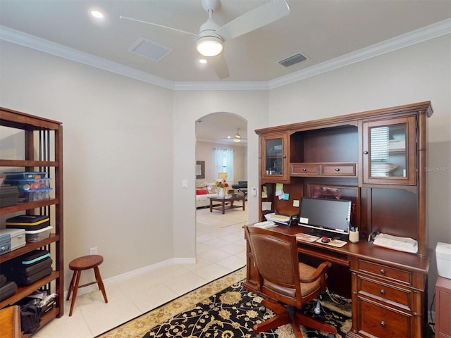 office area with visible vents, light tile patterned flooring, arched walkways, ceiling fan, and crown molding