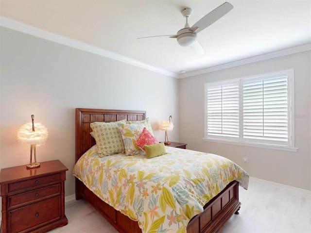 bedroom featuring crown molding, baseboards, and ceiling fan