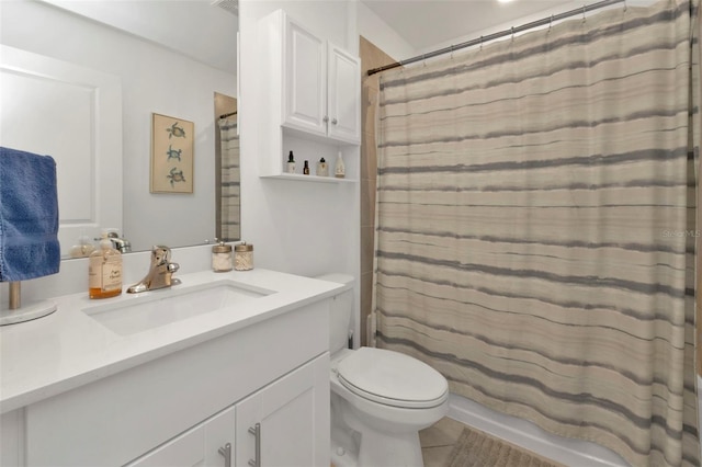 full bath featuring vanity, tile patterned floors, curtained shower, and toilet