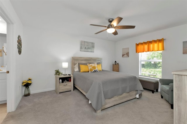 bedroom featuring carpet flooring, a ceiling fan, and baseboards