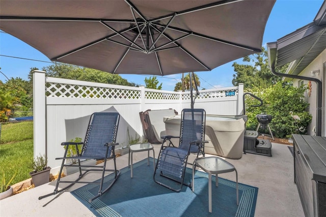 view of patio with fence