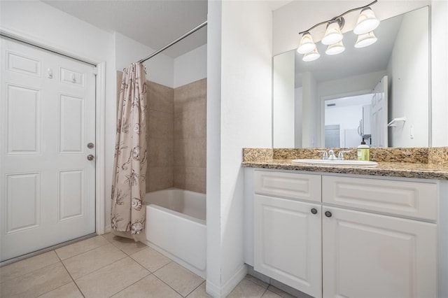 full bath with tile patterned flooring, shower / bathtub combination with curtain, and vanity