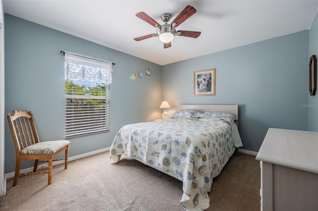 bedroom with baseboards, carpet, and a ceiling fan