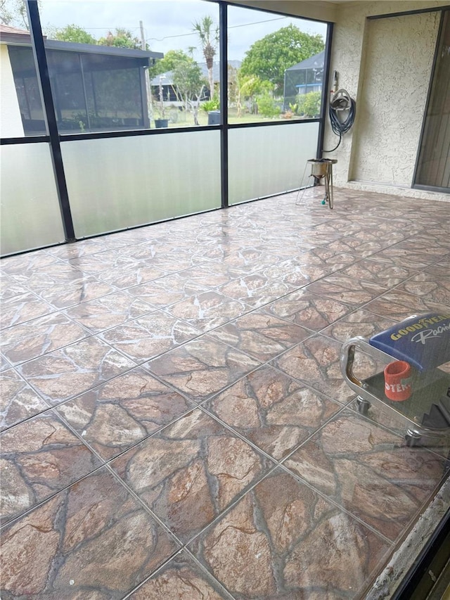 view of unfurnished sunroom