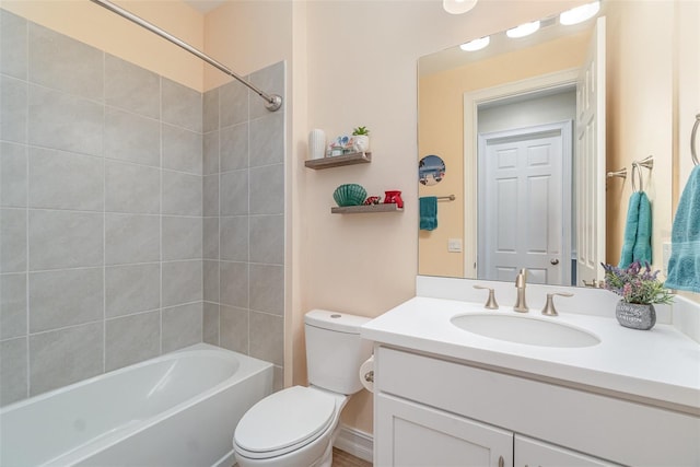 full bathroom featuring vanity, shower / bathing tub combination, and toilet