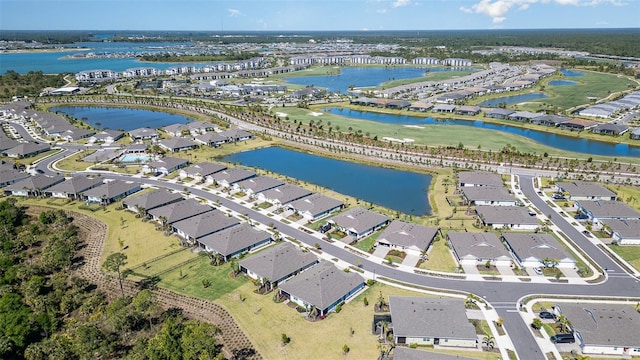 aerial view featuring a residential view and a water view