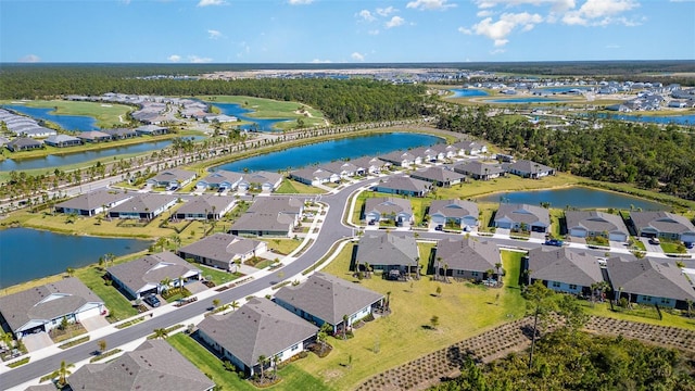 bird's eye view with a residential view and a water view