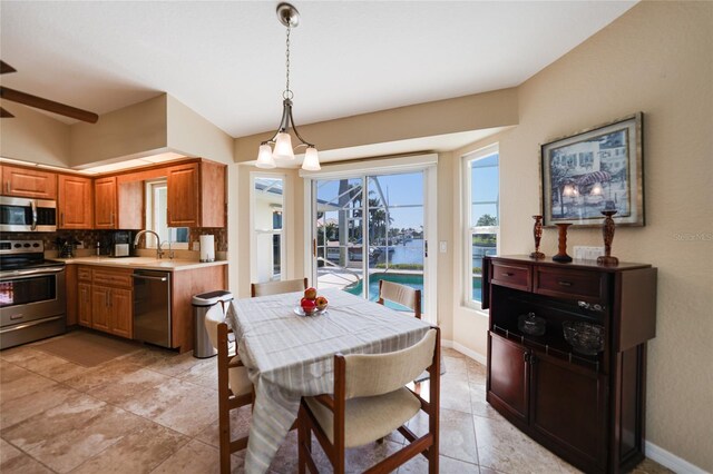 dining area featuring baseboards