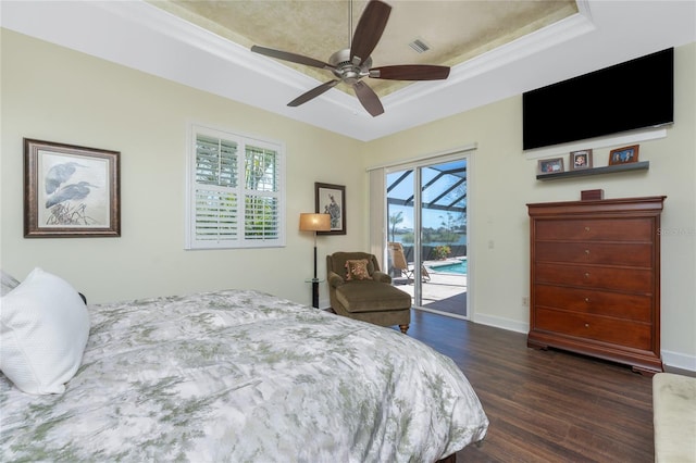 bedroom featuring visible vents, baseboards, dark wood-style flooring, access to exterior, and a raised ceiling