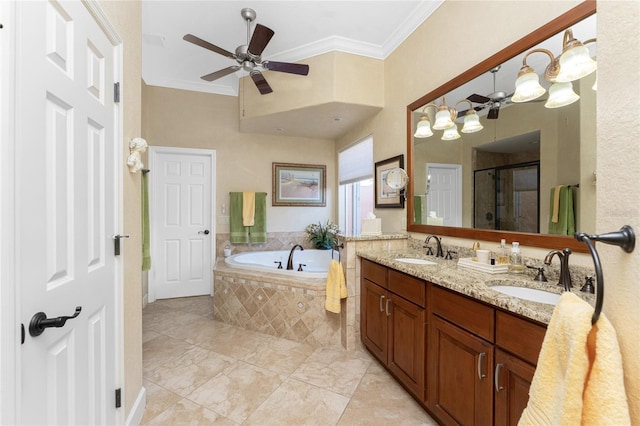 bathroom with crown molding, a garden tub, and a sink