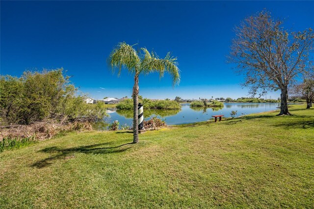 view of yard with a water view