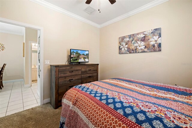 bedroom with ceiling fan, baseboards, visible vents, and ornamental molding