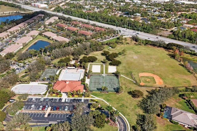 aerial view featuring a residential view and a water view