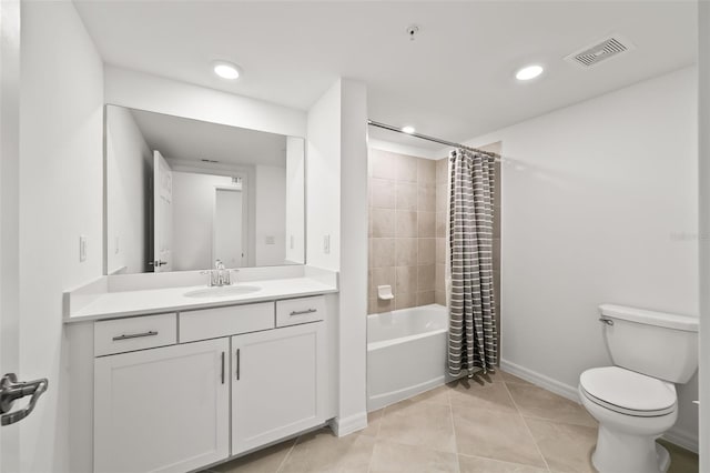 bathroom with visible vents, toilet, shower / bath combo, tile patterned flooring, and vanity