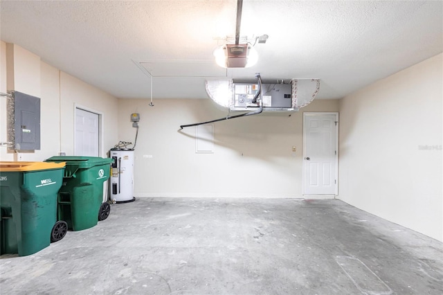 garage featuring electric panel, a garage door opener, and water heater