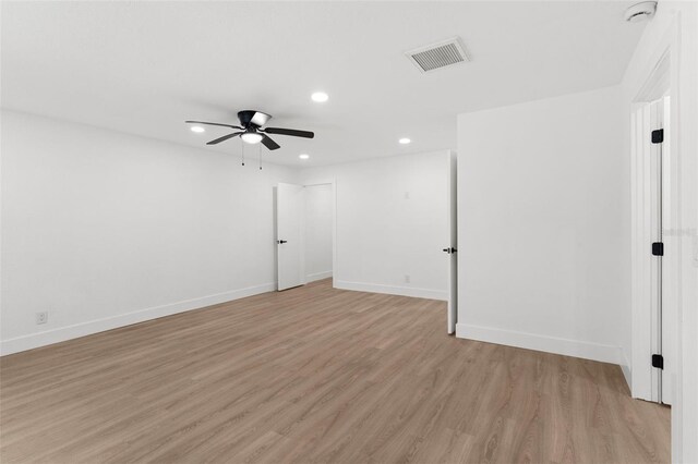 unfurnished room with visible vents, baseboards, recessed lighting, light wood-style floors, and a ceiling fan