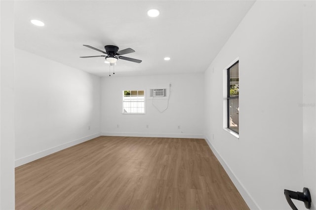 spare room featuring recessed lighting, light wood-type flooring, baseboards, and ceiling fan