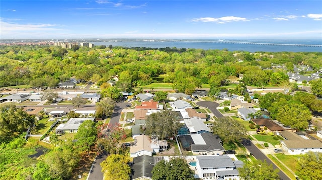 bird's eye view with a residential view and a water view