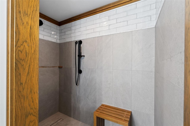 full bathroom with a tile shower