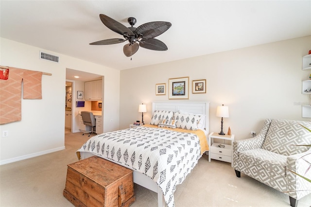 bedroom with baseboards, light colored carpet, visible vents, and ceiling fan