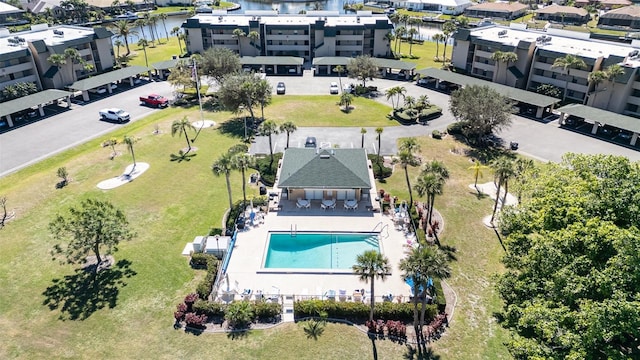 birds eye view of property featuring a water view