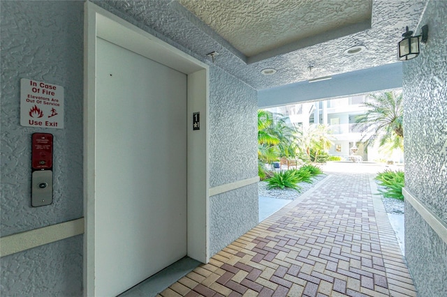 view of patio featuring elevator