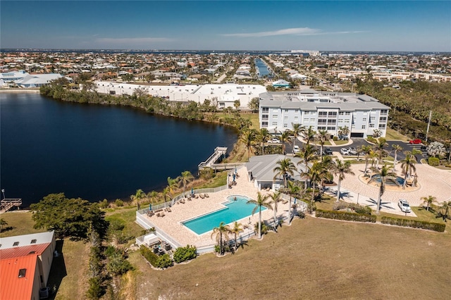 birds eye view of property featuring a water view