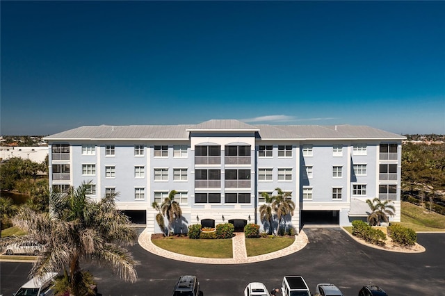 view of building exterior with central AC