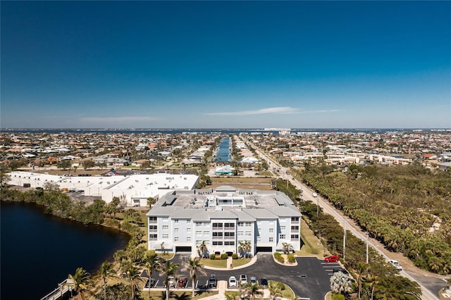 bird's eye view with a view of city and a water view