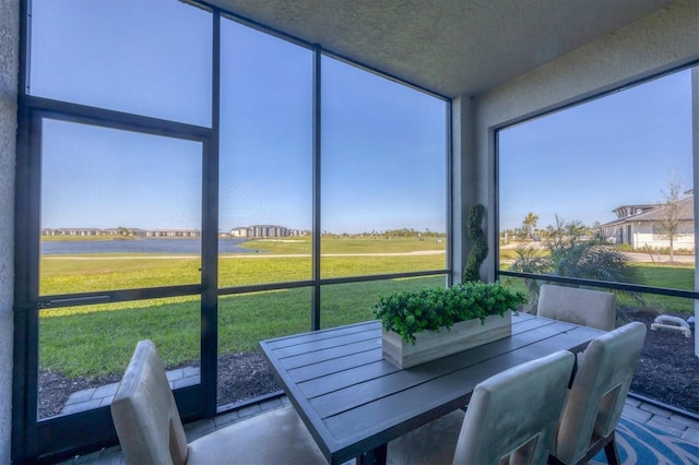 sunroom / solarium with a healthy amount of sunlight