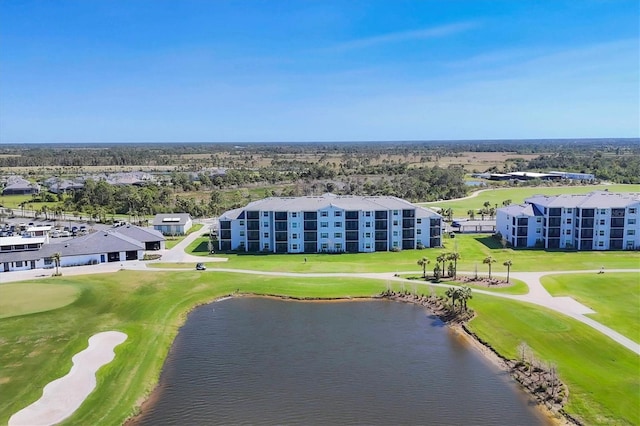 birds eye view of property featuring a water view and view of golf course