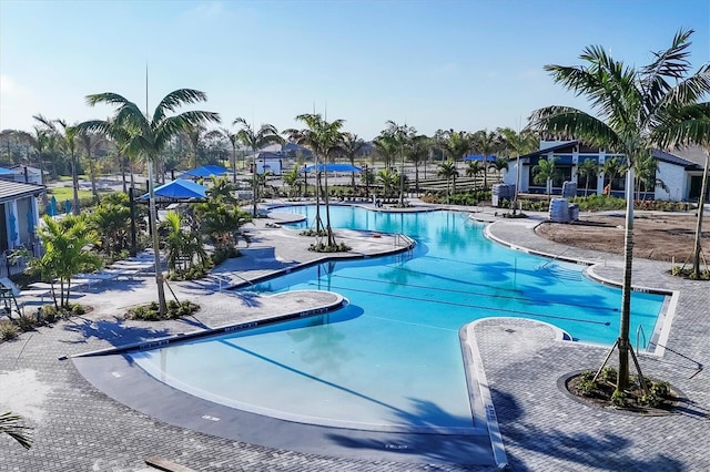 community pool featuring a patio area