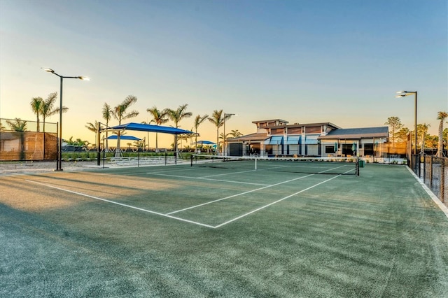 view of sport court with fence