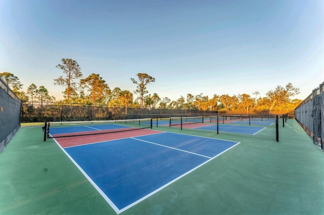 view of sport court with fence