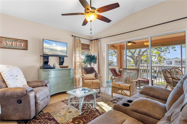 living room featuring vaulted ceiling and ceiling fan