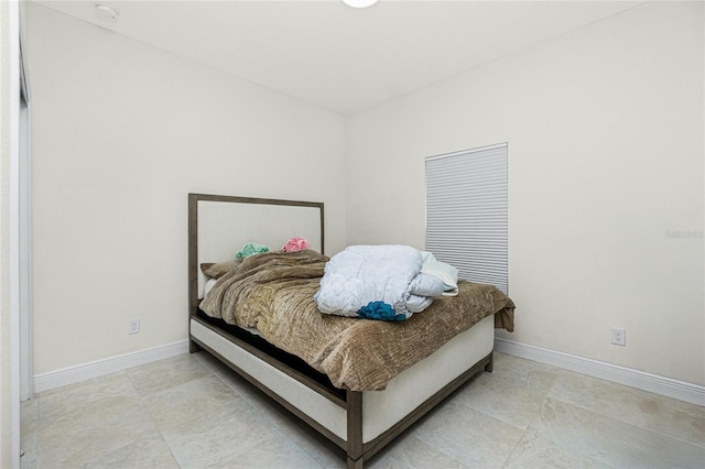 bedroom with baseboards