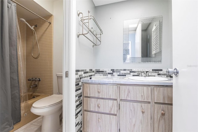 bathroom with tile walls, toilet, shower / tub combo with curtain, tile patterned floors, and vanity