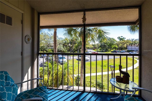 balcony featuring visible vents