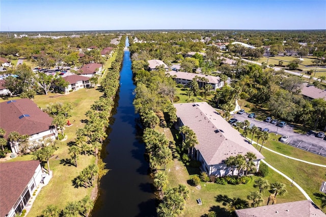 bird's eye view with a water view