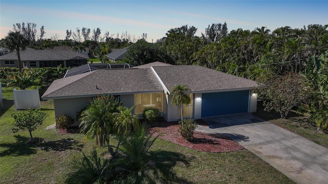 ranch-style home with an attached garage, stucco siding, a shingled roof, concrete driveway, and a lanai